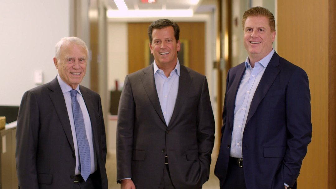 Richard Slifka, Eric Slifka, and Andrew Slifka together at the Global headquarters