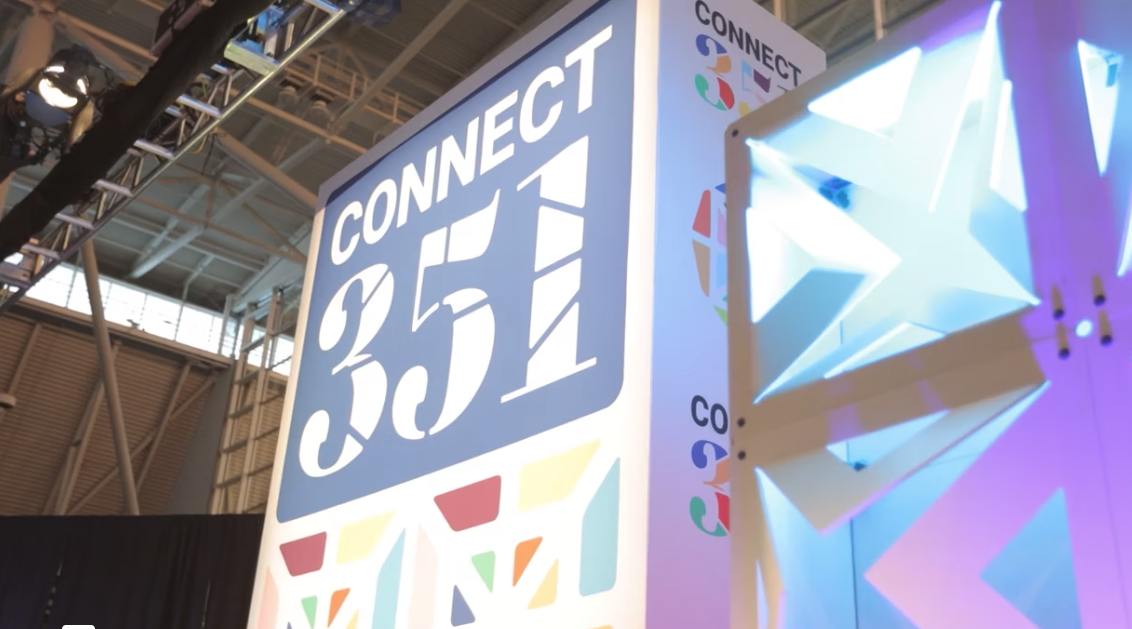 Close up photo of a Connect 351 event tradeshow banner at a previous MMA Connect 351 Conference